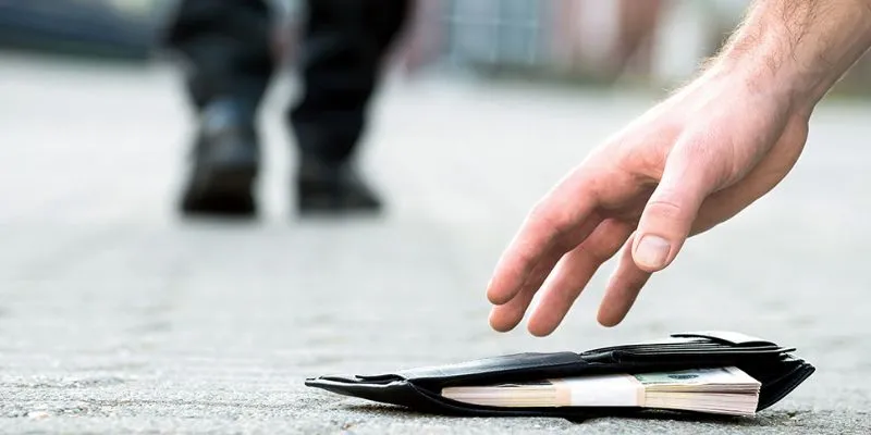 Ý nghĩa khi mơ lượm được tiền trong ví